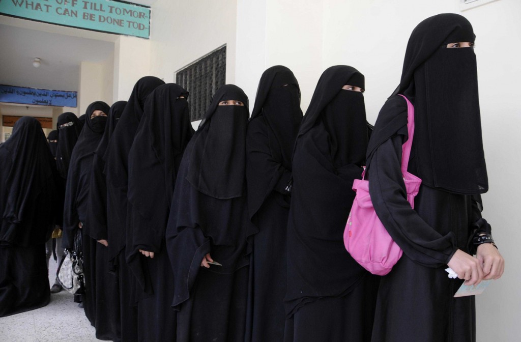 21 February 2012 - Sanaa, Yemen - Yemeni women wait to cast their ballots at a polling station in Sanaa, capital of Yemen, Feb. 21, 2012. More than 10 million eligible voters are expected to cast their ballots at about 29,000 polling stations across Yemen from 8:00 ( 0500 GMT) to 18:00 (1500 GMT), with over 100,000 soldiers guarding the process. However, a string of attacks on election committees flared up in the country's restive southern regions. Photo Credit: Mohammed Mohammed/Xinhua/Sipa Press/1202221850